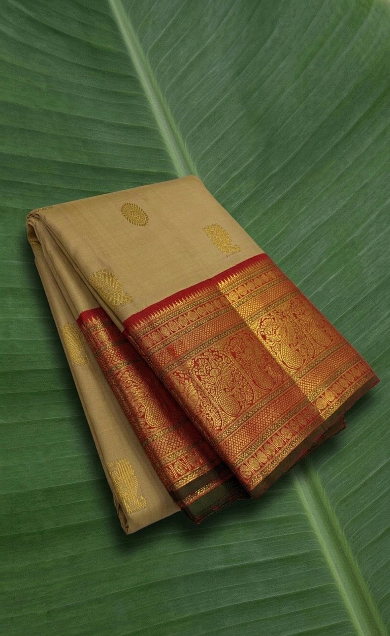 Warm Beige and Deep Vermillion Handwoven Pure Silk Kanchipattu Saree with Varisaipet Sorgavaasal Mayil Border