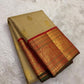Warm Beige and Deep Vermillion Handwoven Pure Silk Kanchipattu Saree with Varisaipet Sorgavaasal Mayil Border