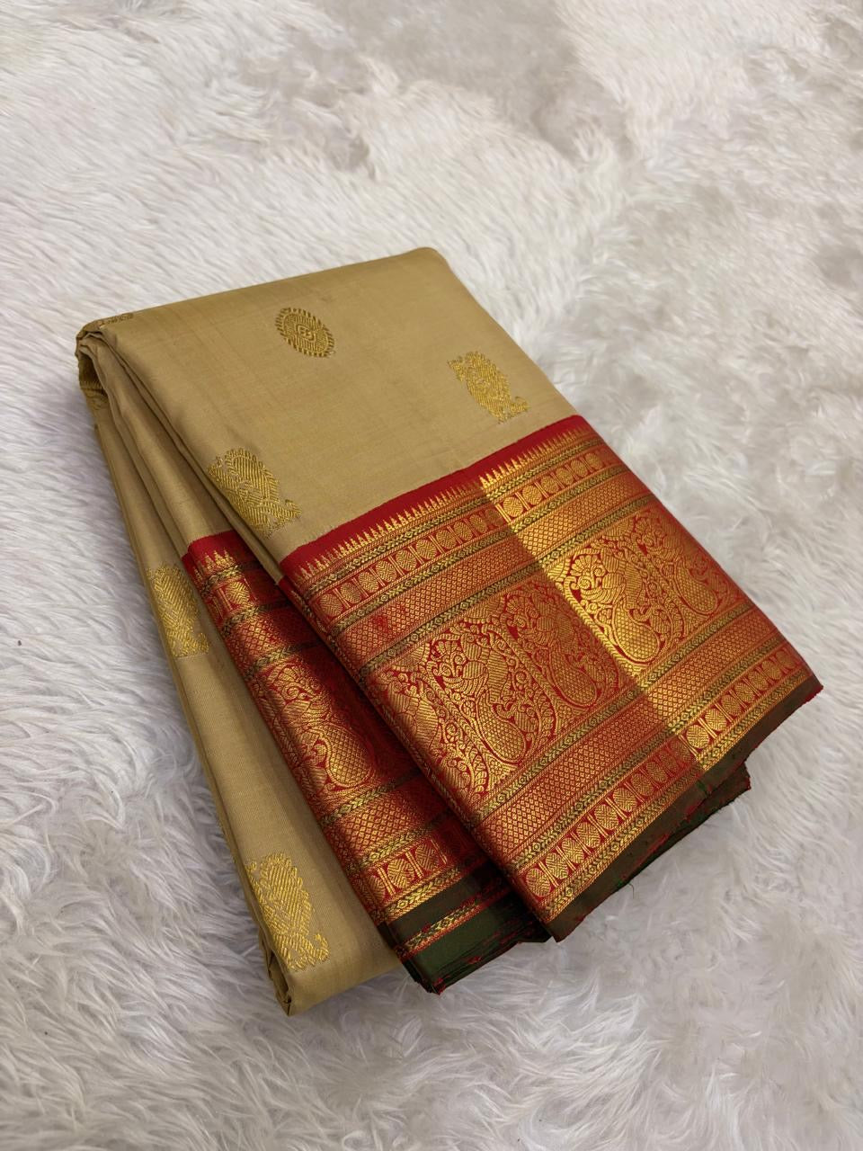 Warm Beige and Deep Vermillion Handwoven Pure Silk Kanchipattu Saree with Varisaipet Sorgavaasal Mayil Border