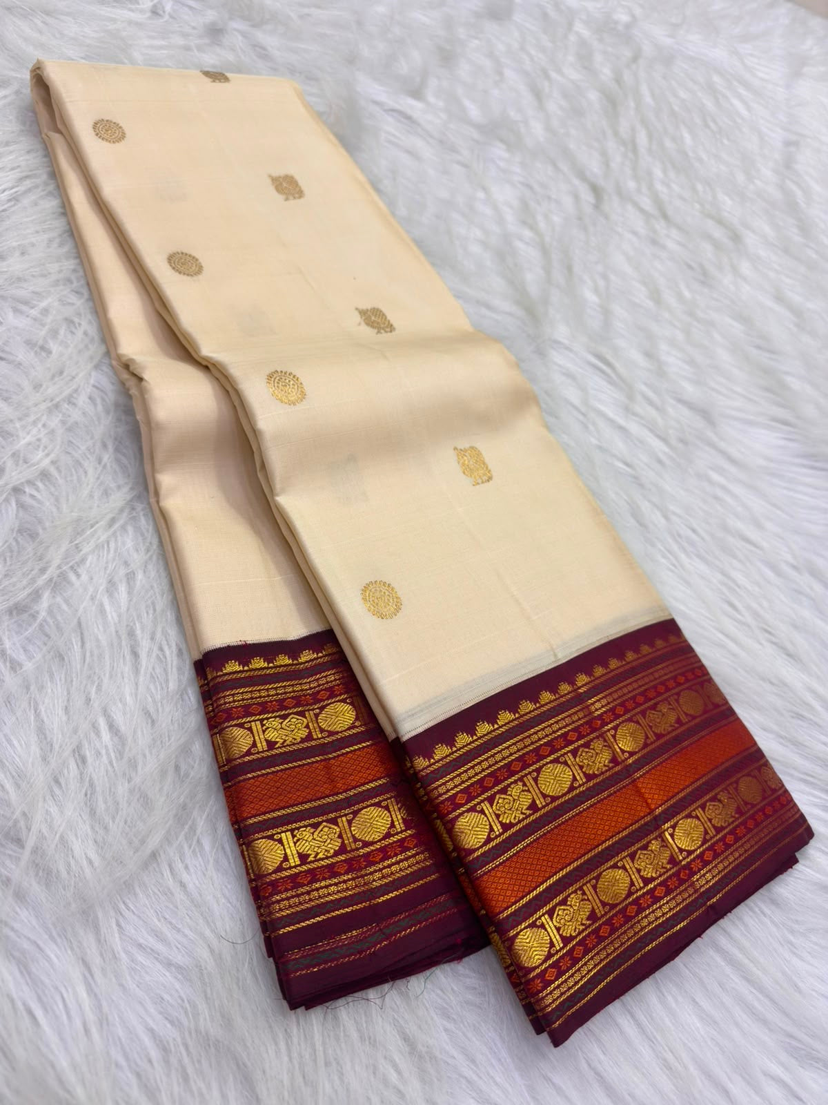Warm-ivory pure silk Kanjivaram Korvai saree with Arakku red border, full drape — Idam Living