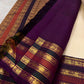 Warm Ivory Pure Silk Kanchipuram Varisaipet saree with petite gold buttas and aubergine multi-motif zari border.