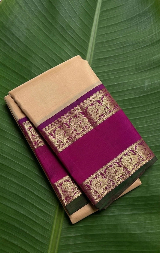 Warm ivory beige pure silk Kanchipuram saree with raspberry pink rettapet border and manthulir selvedge — front view — Idam Living