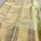 Detailed Warm Ivory Kanchipuram pallu with dense metallic zari geometry, ornamental registers and Mint Green finish.