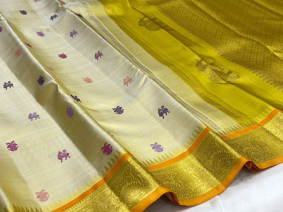 Warm Ivory Kanjipuram saree with Gandaberunda and Yazhi buttas - Idam Living
