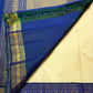 Mayil Kazhuthu double-shade Korvai border with repeating gold Mayil motifs on pure silk saree.