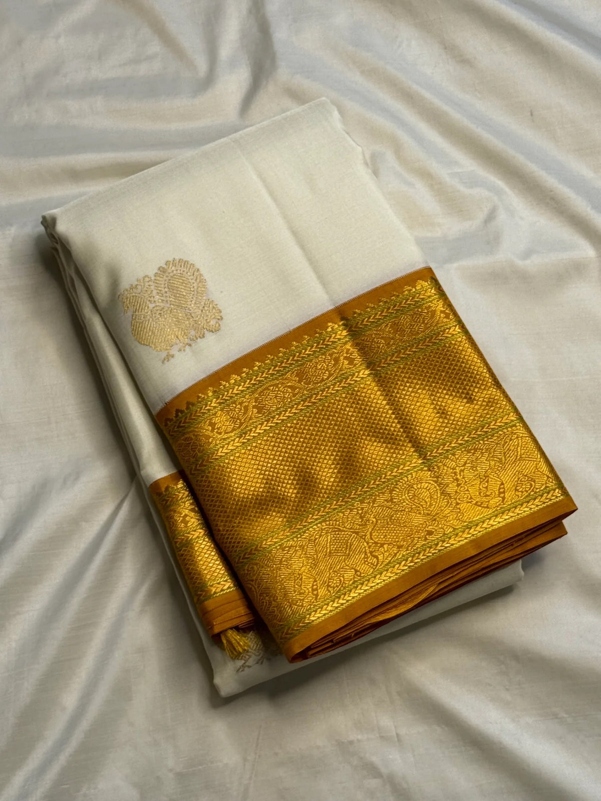 Korvai Kanchipuram saree with ornate antique gold zari pallu
