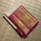 Warm Ivory Kanchipuram saree with Vadamalli Purple Yaanai border detail