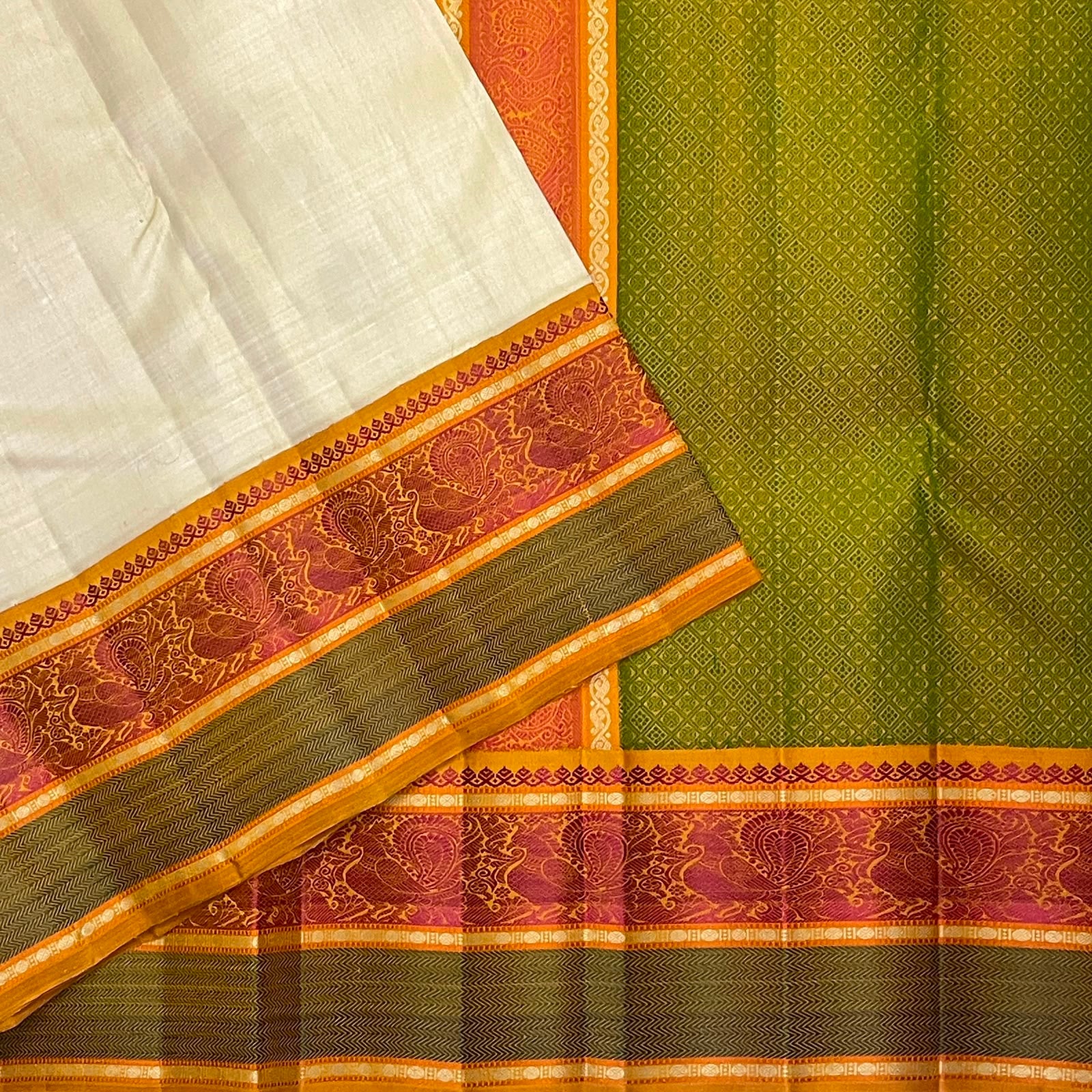 Warm ivory handwoven pure silk Kanjivaram Pattupet saree with no-zari silk thread border, styled view