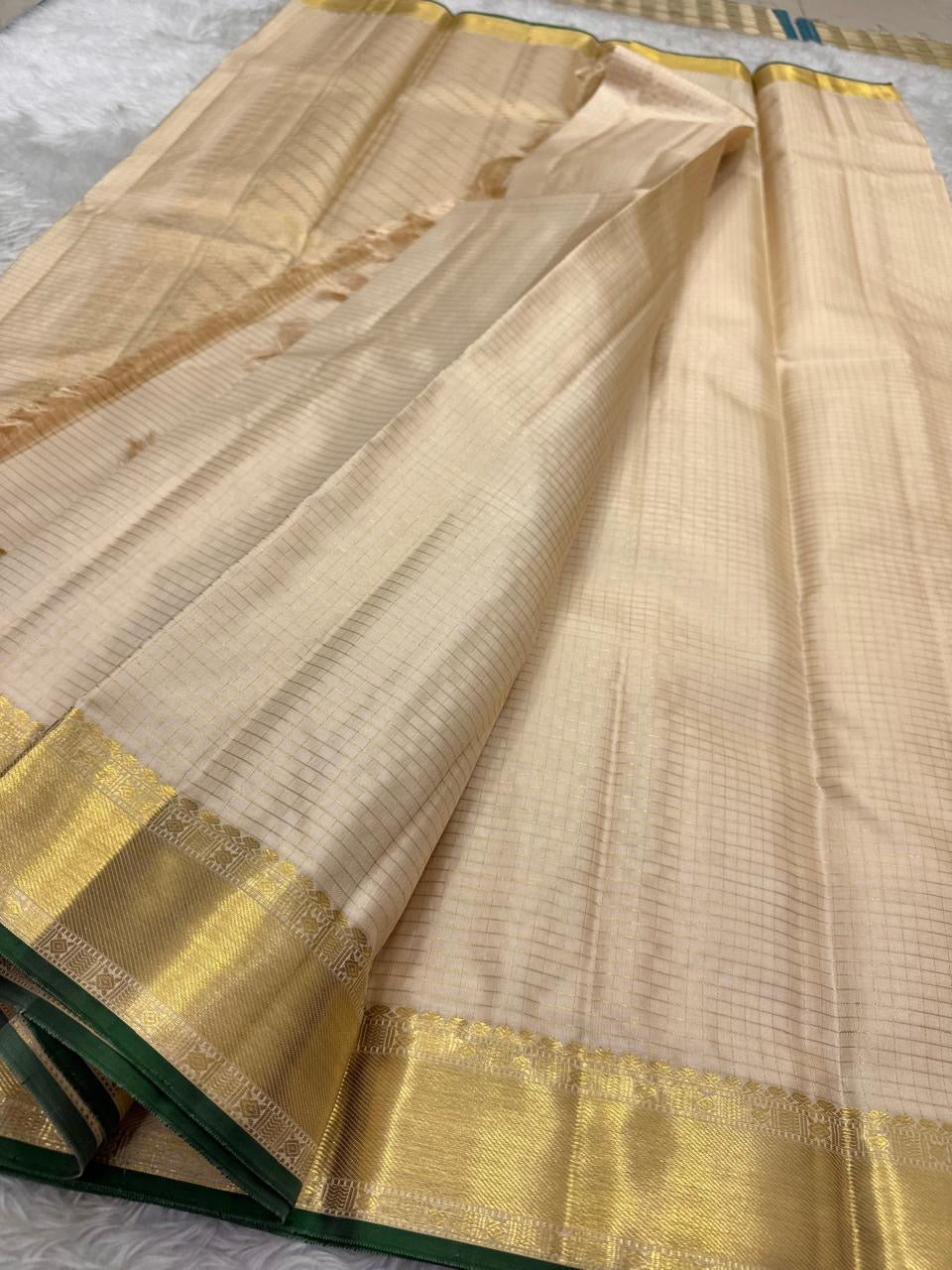 Warm Ivory Kanchi Pattu silk saree, border close-up detail — Idam Living