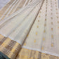 Close view of intricate gold zari motifs on Warm Ivory Kanchipuram border