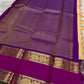 Warm ivory Kanchipattu saree with raspberry pink rettapet border — traditional gold zari — Idam Living