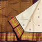 Warm Ivory Pure Silk Kanchipuram Saree | Butta | Aubergine Zari Border