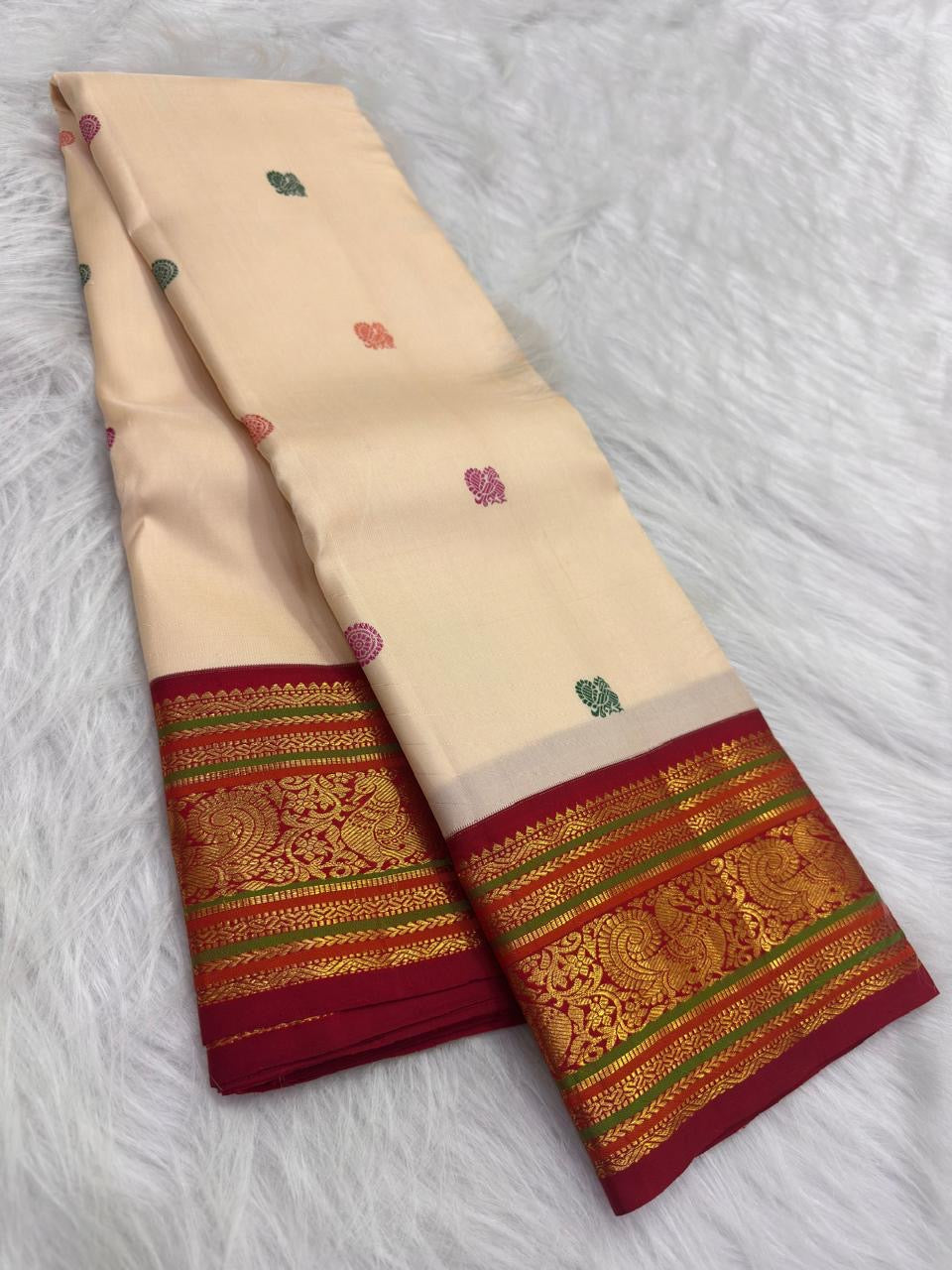Warm Ivory Handwoven Pure Silk Kanchipuram Saree with Deep Crimson Varisaipet Border