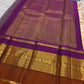 Warm Ivory VarnaJaalam Kanchipuram silk with varied horizontal gold zari motif stripes and multicolour contrast border.