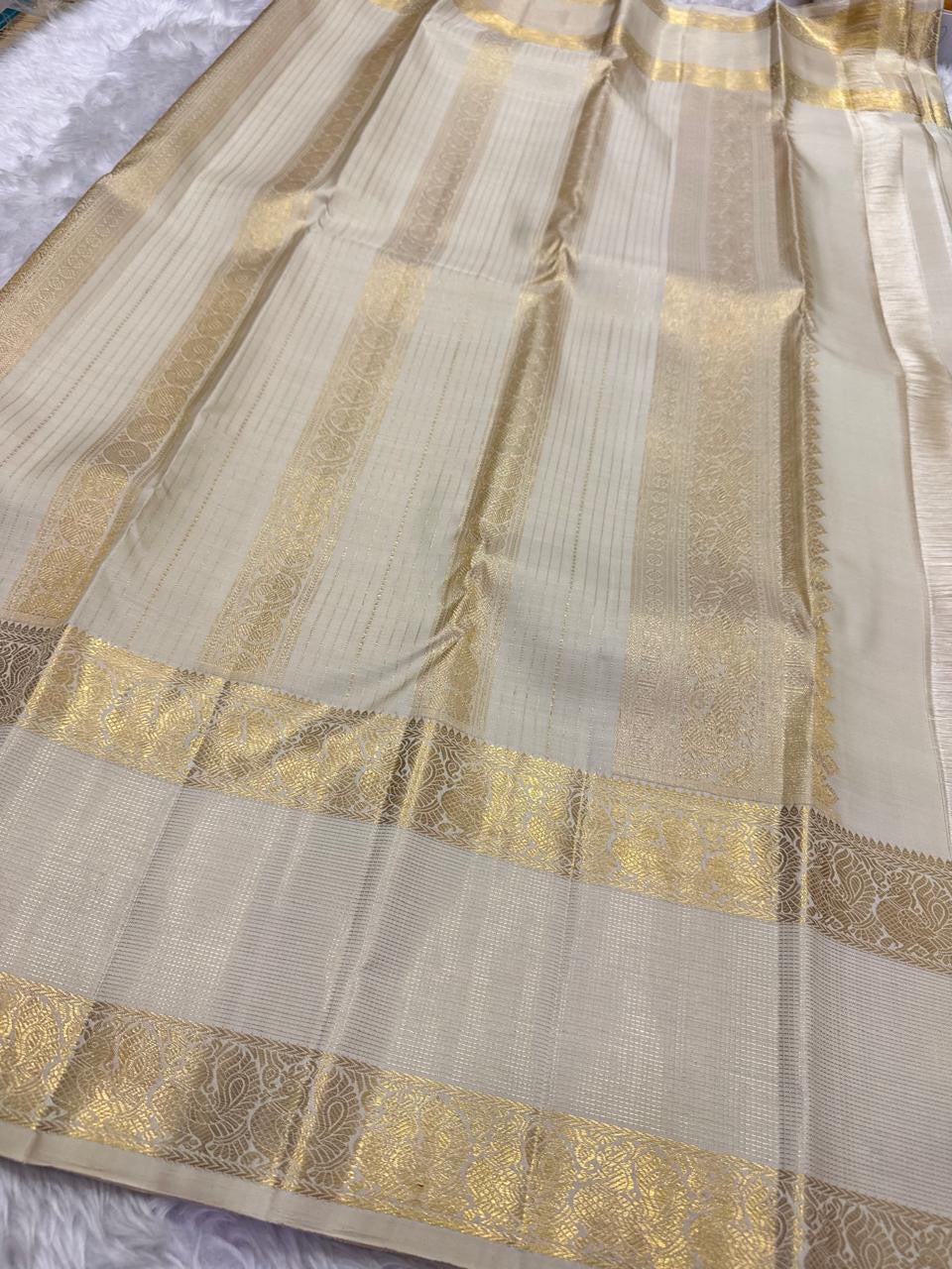 Handwoven Warm Ivory Pure Silk Kanchipuram Rettapet saree with bird and Kodi vine zari border