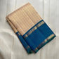 Warm Ivory Handwoven Pure Silk Kanjivaram Saree with Zari Kattam and Peacock Blue-Green Shot Border