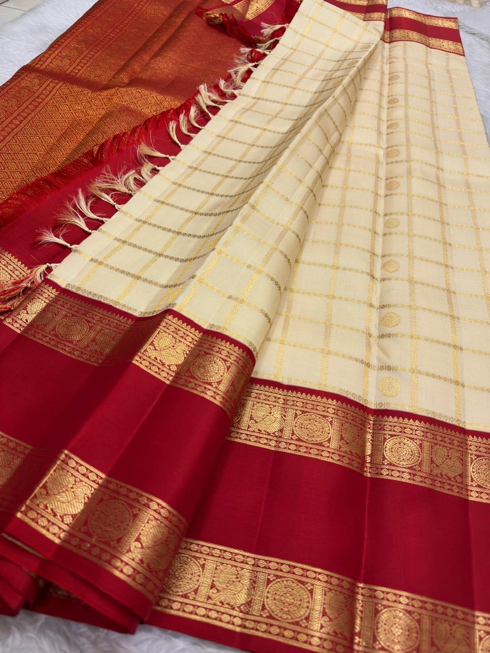 Warm Ivory Handwoven Pure Silk Kanjipuram Saree with Zari Kattam and Pillar-Box Red Border