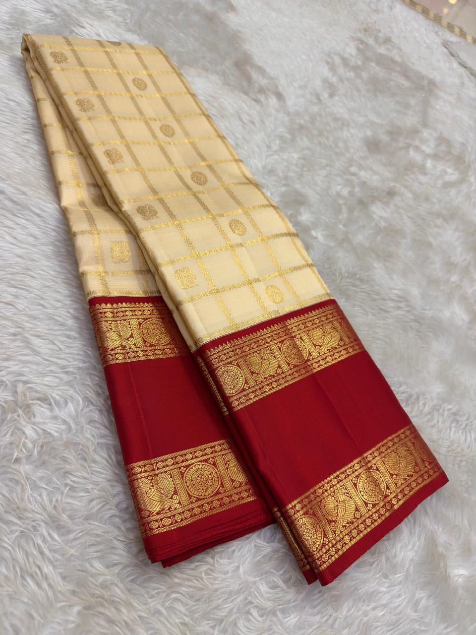 Warm Ivory Handwoven Pure Silk Kanjipuram Saree with Zari Kattam and Pillar-Box Red Border