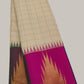 Close view of multicolour temple-like edging on a Warm Ivory pure silk Ettukol Kanchipuram saree.