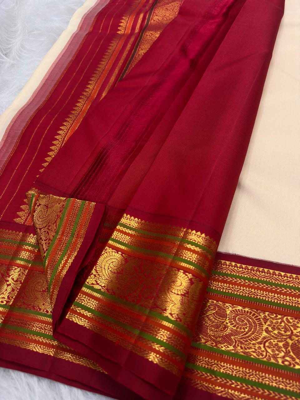 Warm Ivory Handwoven Pure Silk Kanchipuram Saree with Deep Crimson Varisaipet Border
