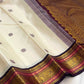 Warm Ivory Pure Silk Kanchipuram Saree | Butta | Aubergine Zari Border