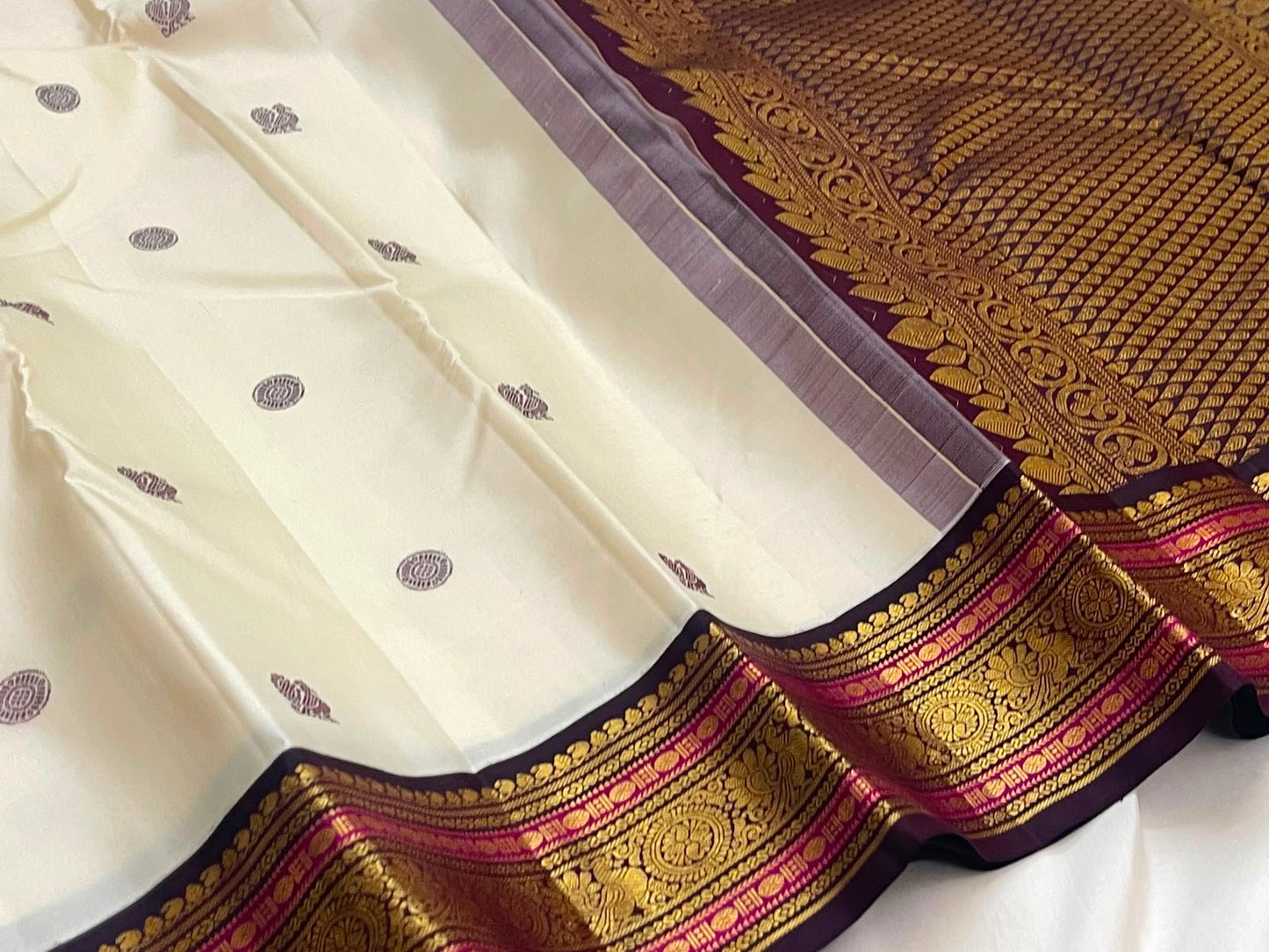 Warm Ivory Pure Silk Kanchipuram Saree | Butta | Aubergine Zari Border