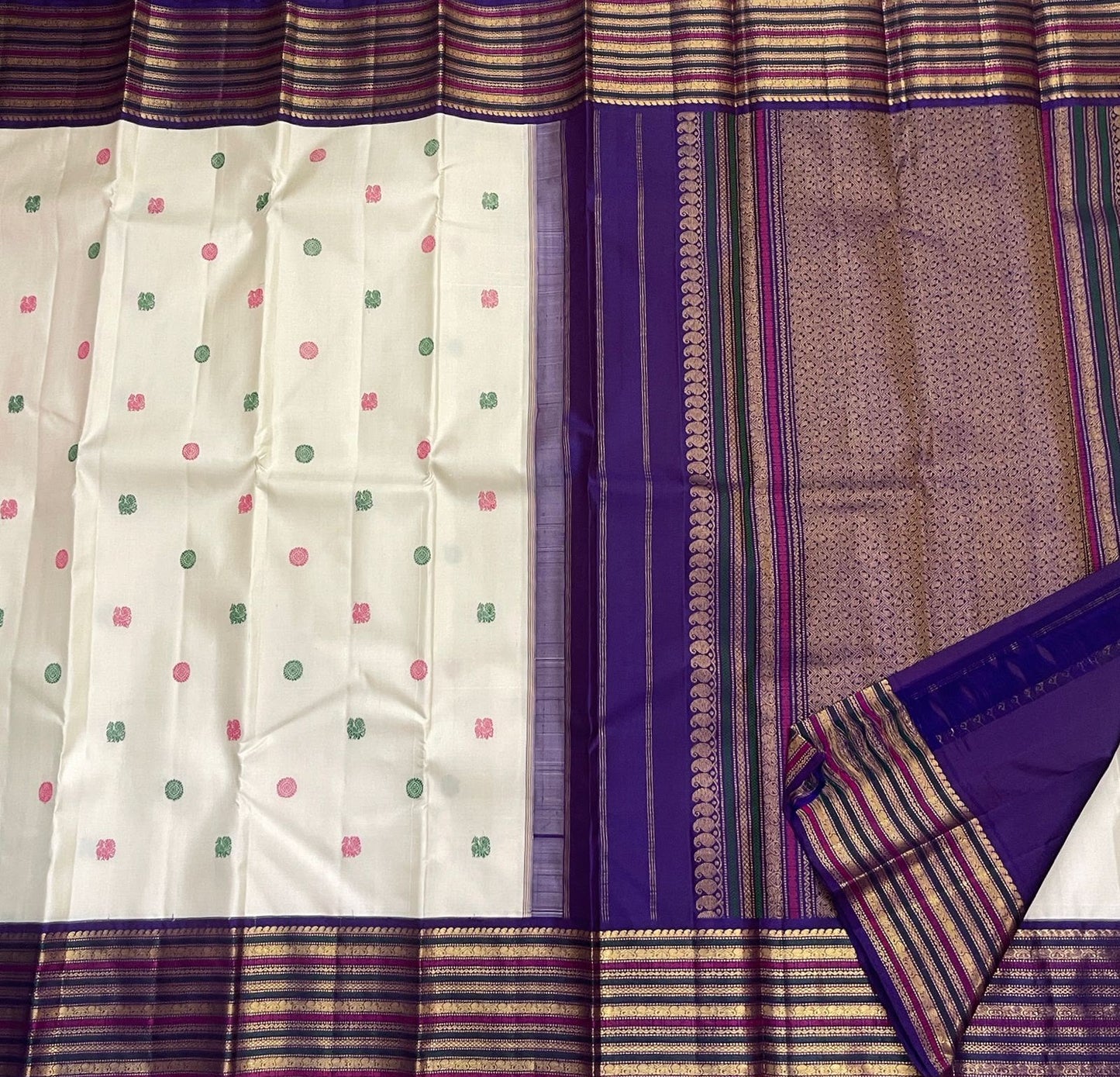 Warm Ivory Pure Silk Kanjivaram Varisaipet saree with Royal Purple broad border