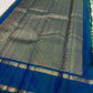 Warm Ivory Handwoven Pure Silk Kanjivaram Saree with Zari Kattam and Peacock Blue-Green Shot Border