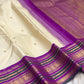Handwoven ivory Kanchipuram silk saree with 2-gram antique gold zari buttas