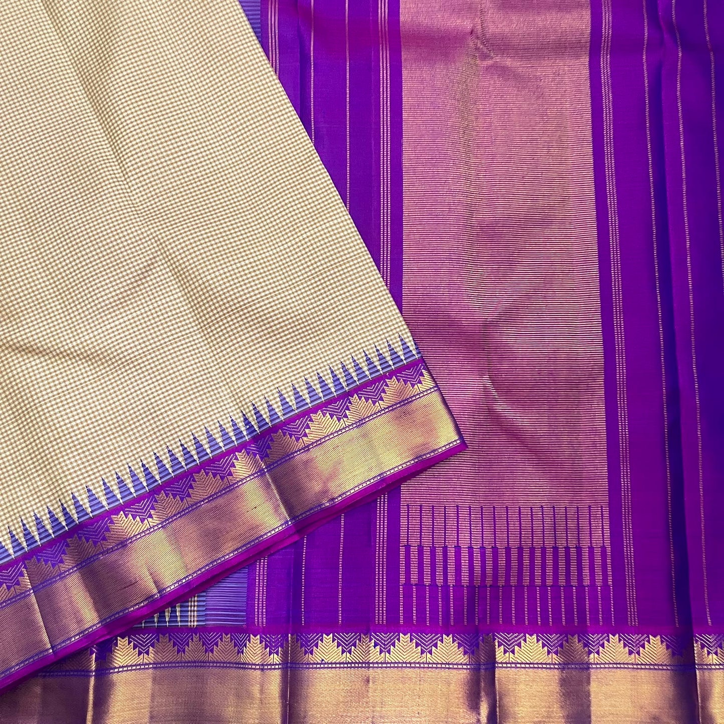 Warm ivory taupe handwoven pure silk Kanjipuram saree with Pillayar Reku zari border, styled view