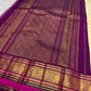 Vadamalli Magenta KanchiPattu border with ornamental gold zari and coloured silk-thread registers.
