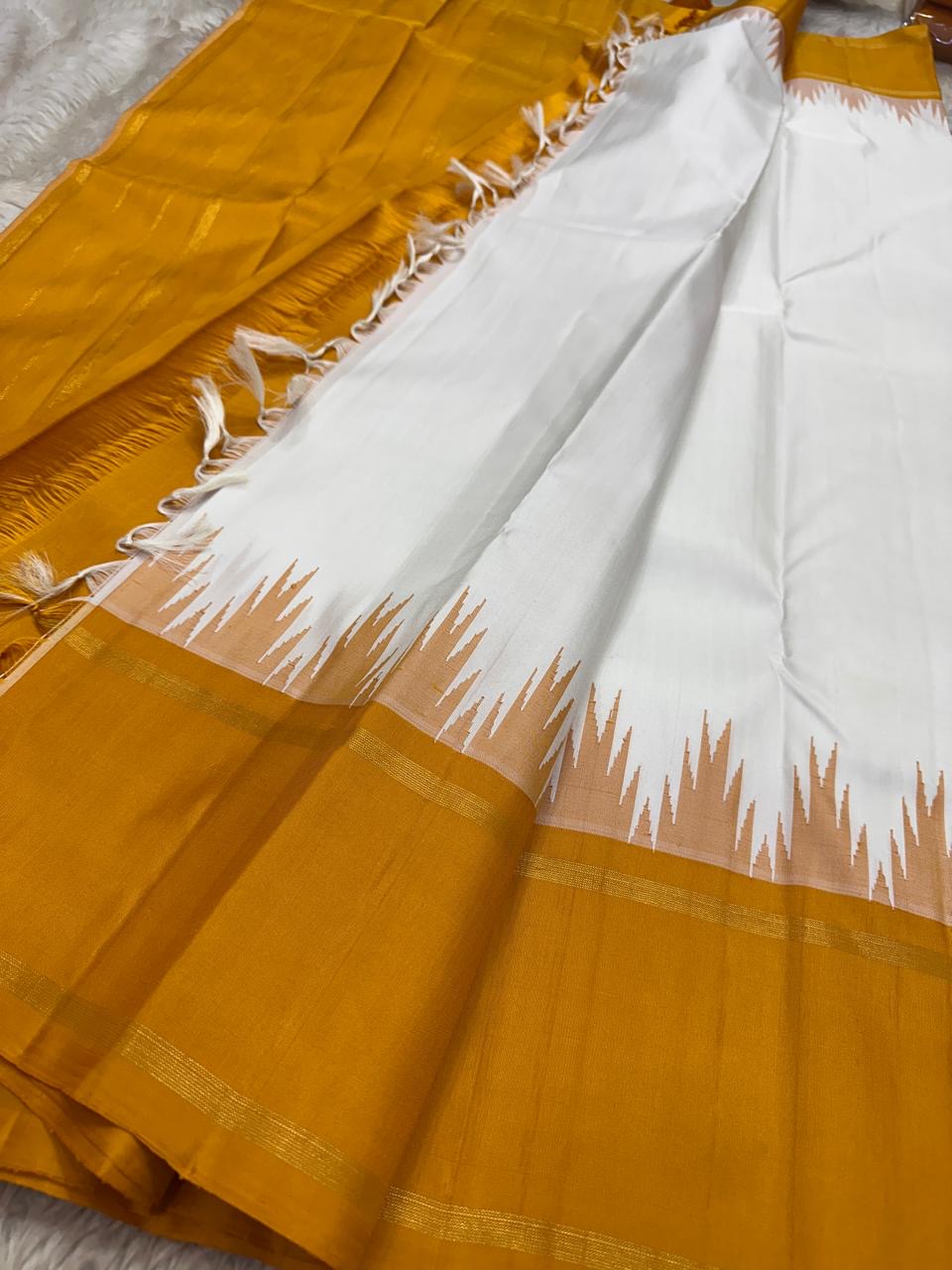 White Pure Silk Kanjivaram saree with elegant korvai contrast