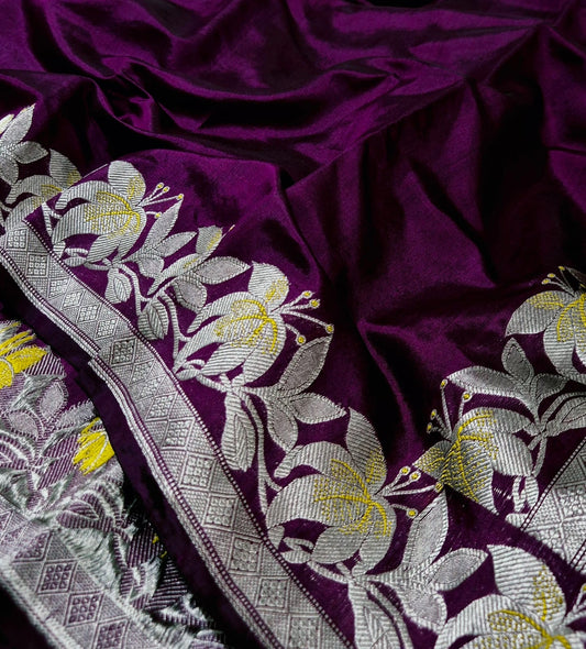 Wine Blossom Pure Silk Chanderi Saree neatly folded with Antique Silver Border