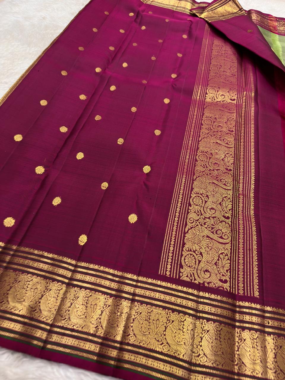 Raspberry wine border Kanchipattu silk saree – folded view