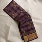Close-up of wine purple Kancheepuram silk saree border showing dense floral jaal gold zari weaving — Idam Living
