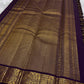 Close-up of wine purple Kanchipuram Zari Kattam silk saree body showing Kili butta within gold check weave — Idam Living