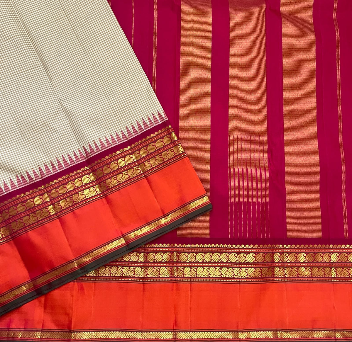 Woven floral gold zari border register on a biscuit beige and orange Kanchipuram silk saree