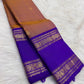 Fine hand-laid gold oosivaanam stripes across sandalwood copper and royal violet silk