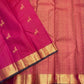 Heritage border with Yaanai pet and Mayil kan pet gold zari detailing on a deep pink Kanjivaram saree