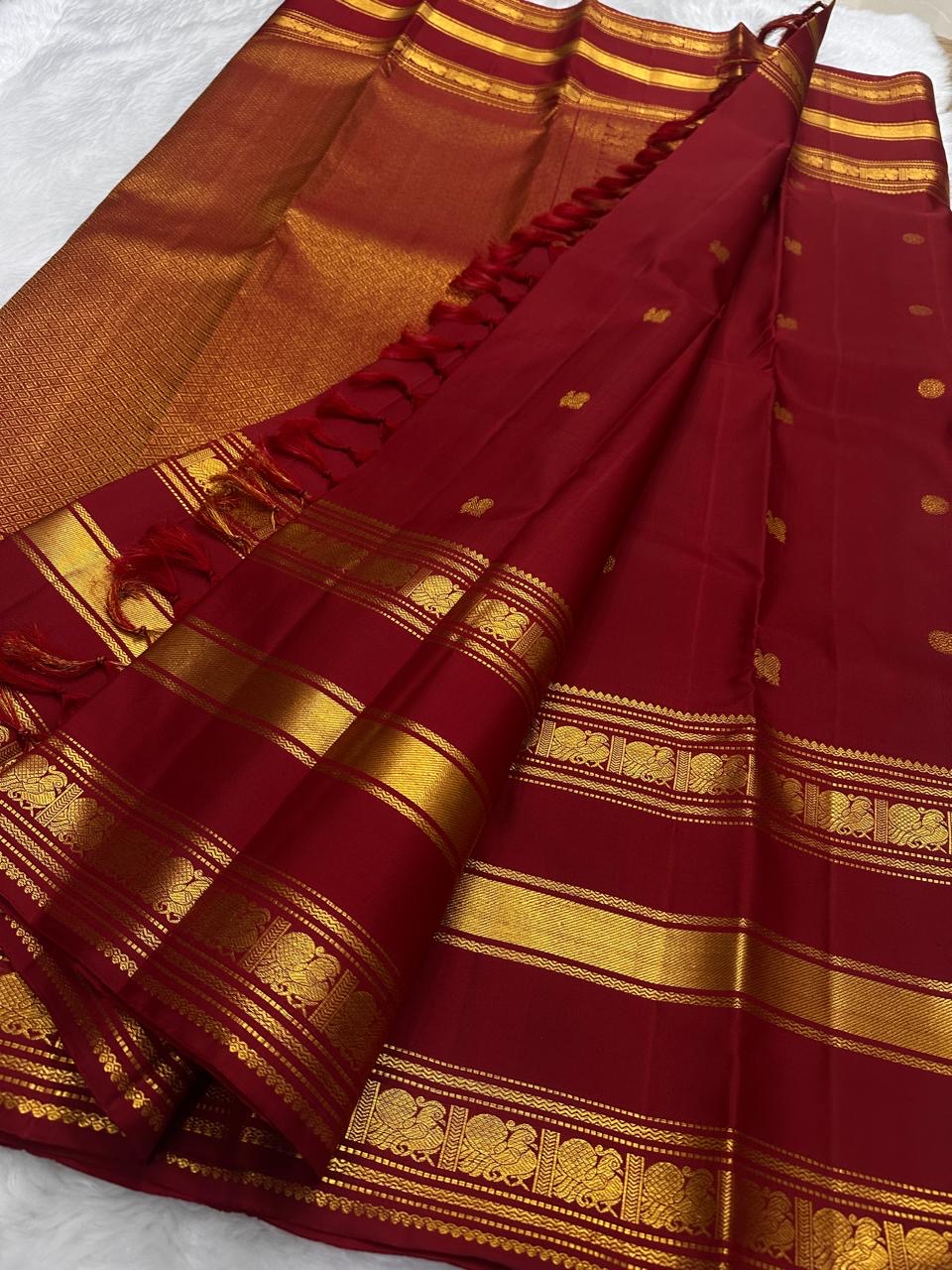 Yaanai and Reku temple-edge detailing on the Varisaipet border of the Arakku Red Kanchipuram saree