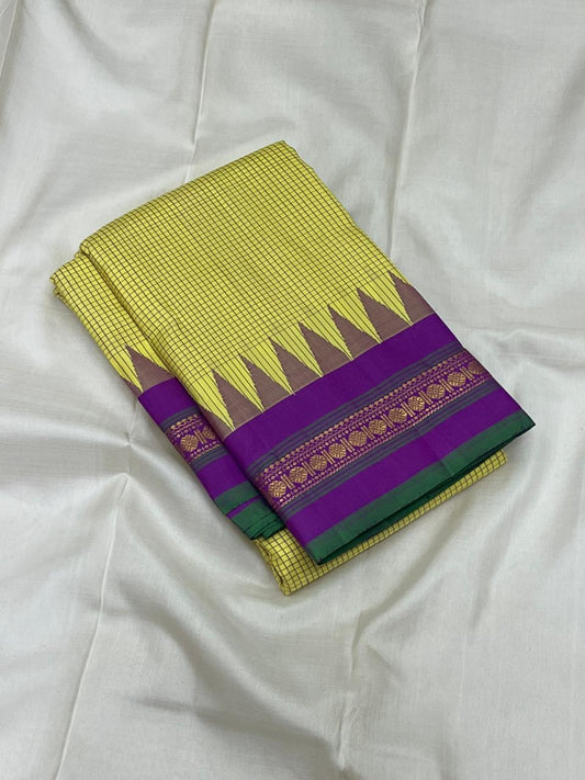 folded chartreuse checked kanchipuram silk saree with purple border and green selvedge
