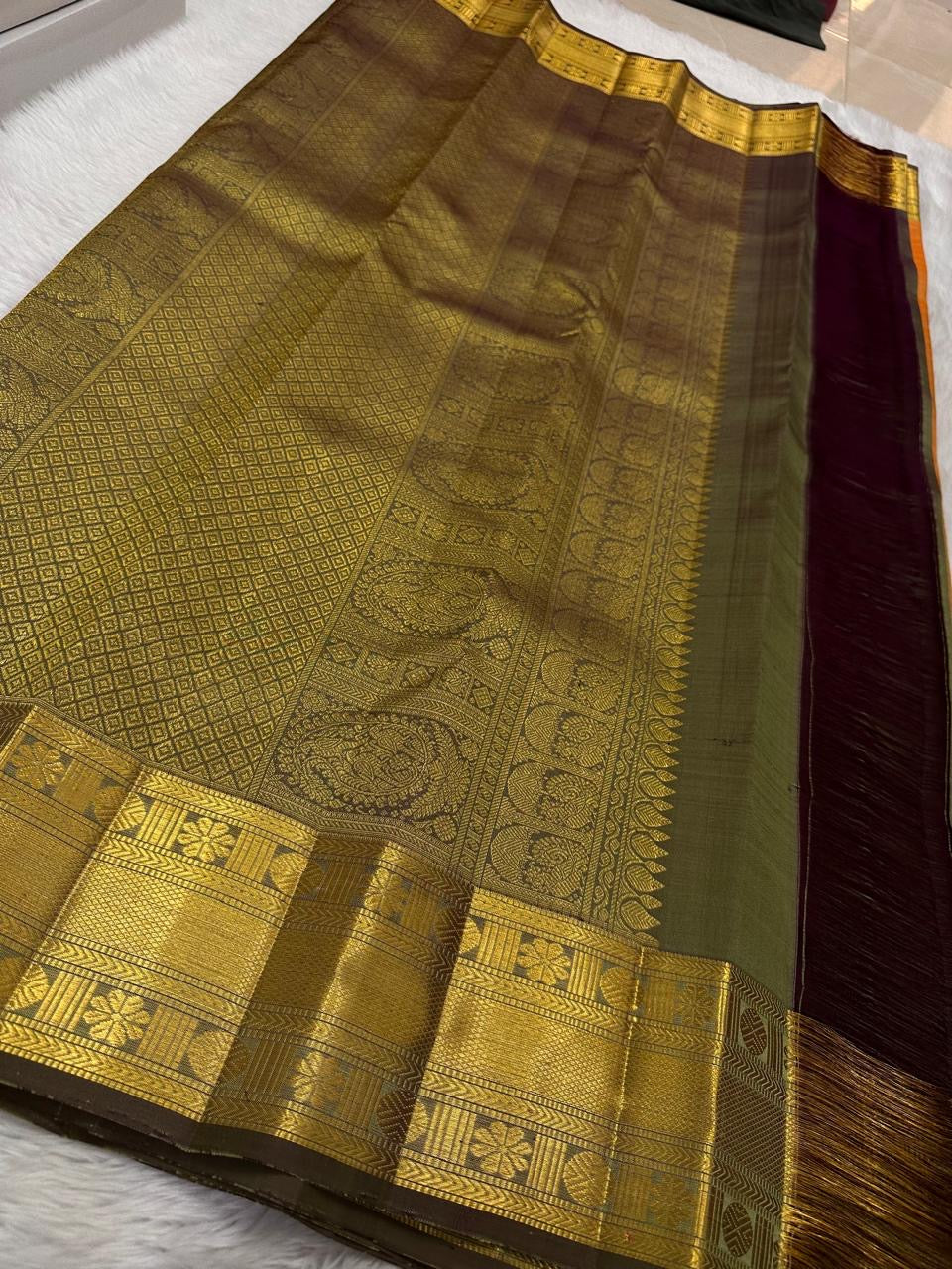 Mango-yellow pure silk Kanjeevaram saree, folded view — Idam Living