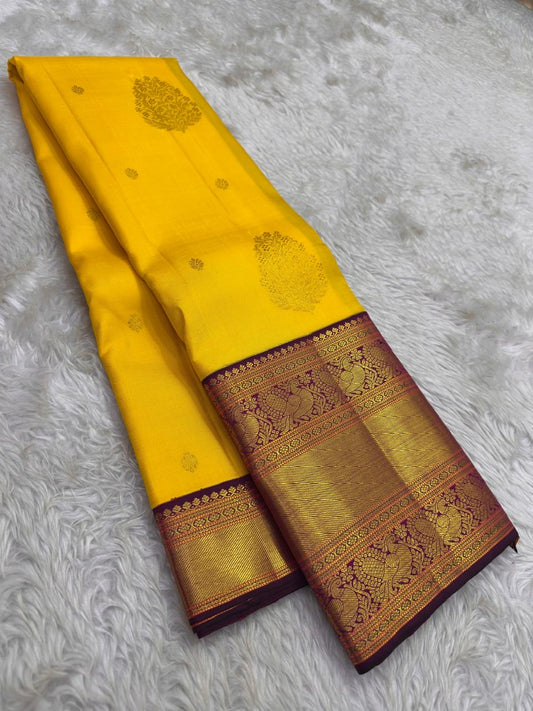 Turmeric Yellow Pure Silk Kanchipuram saree with gold zari contrast border