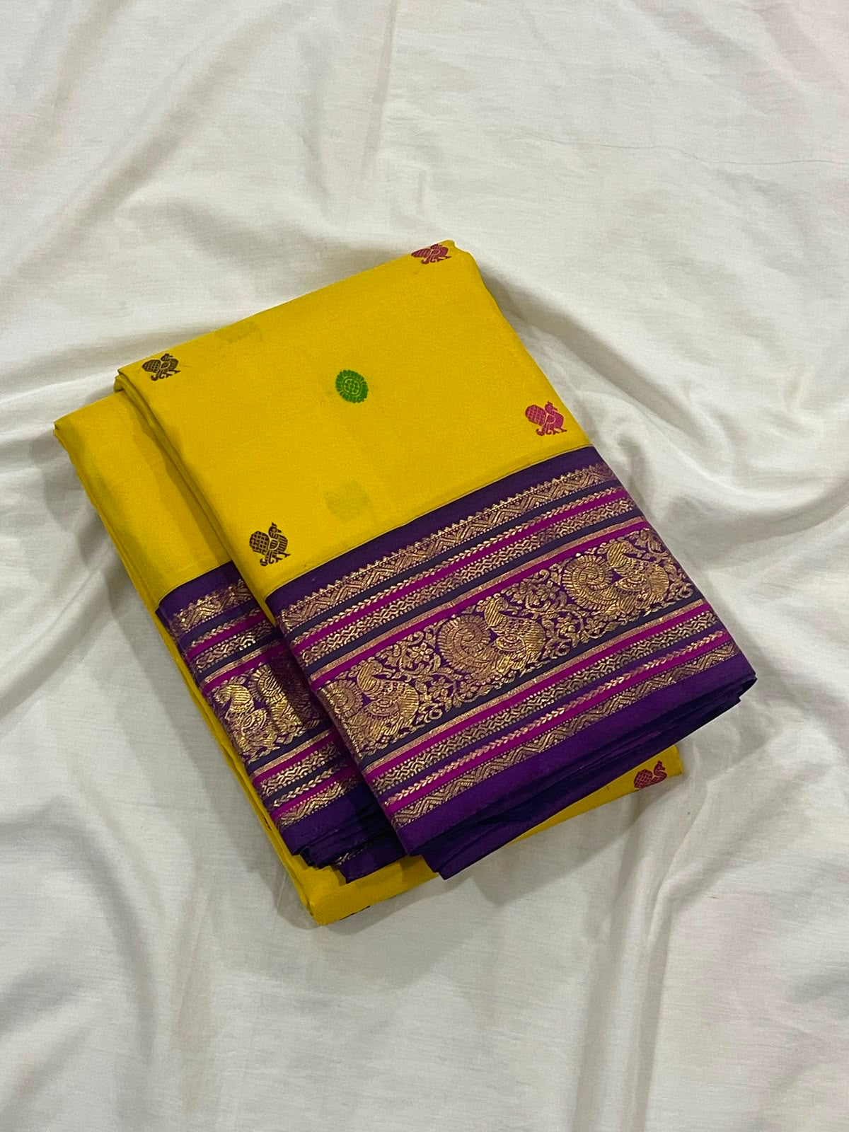 Turmeric Yellow pure silk Kanchipuram saree — full drape, purple contrast