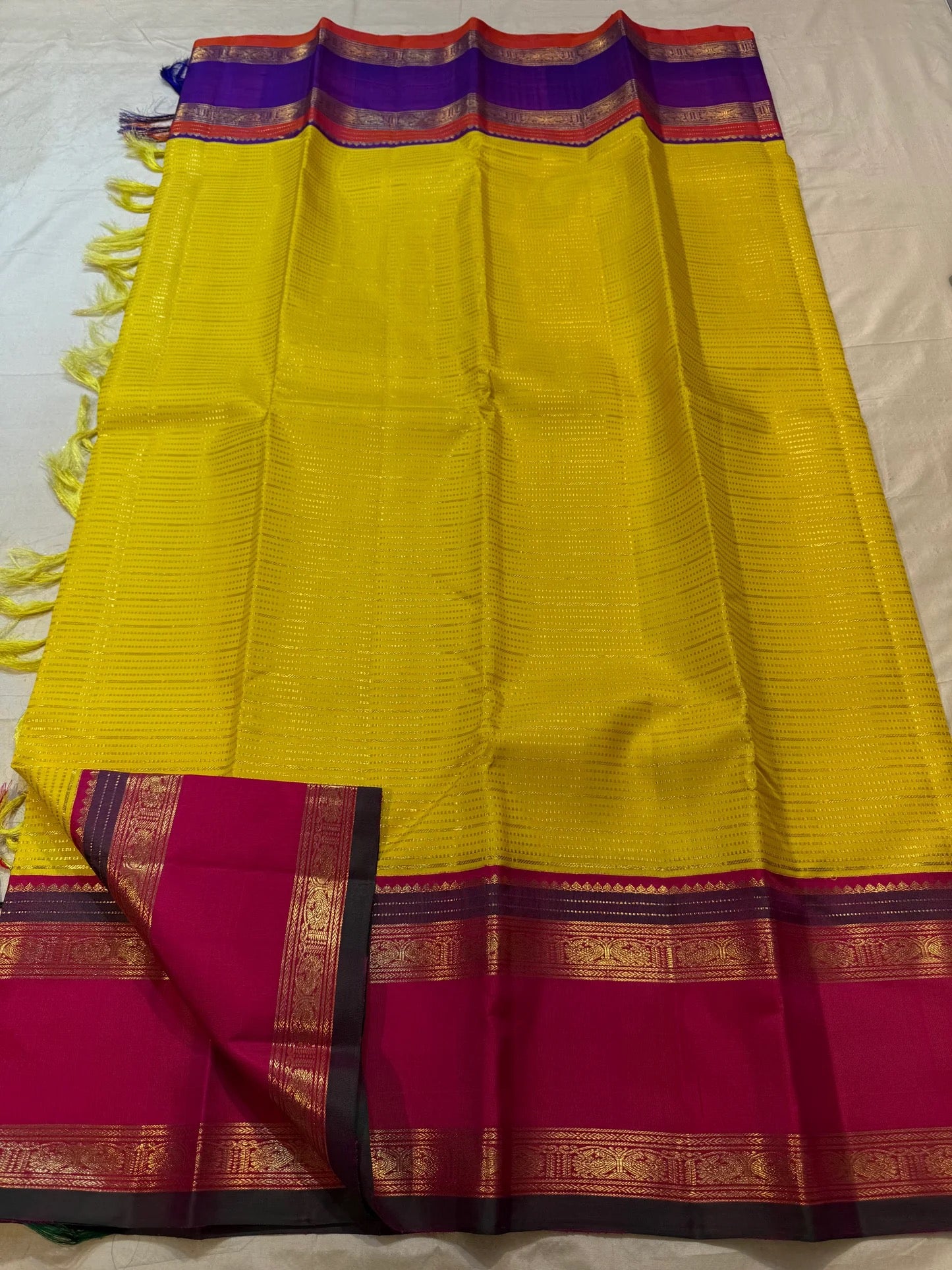 Handwoven Ganga Jamuna Rettapet saree with Royal Purple and Rani Pink contrast borders.