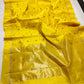 Yellow Chanderi saree with ruby-red and silver-toned buttas