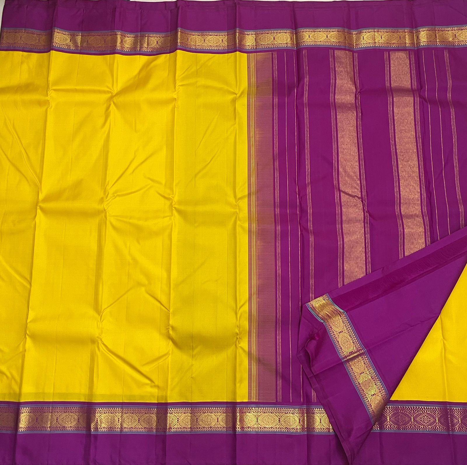 Purple pallu with zari stripes and gold zari border beside yellow silk body, shipped from New Jersey USA