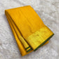 Close-up of yellow silk body showing radiant Zari Kattam gold grid on thick-ply pure mulberry silk