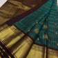Fine gold zari grid on teal green Zari Kattam Kancheepuram saree
