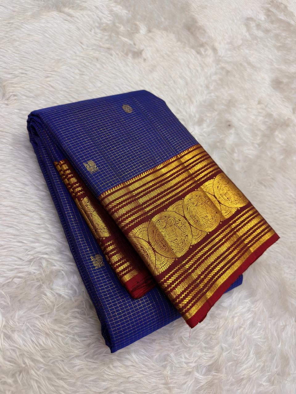 royal blue Kanchipuram silk saree with zk-yb weave folded view